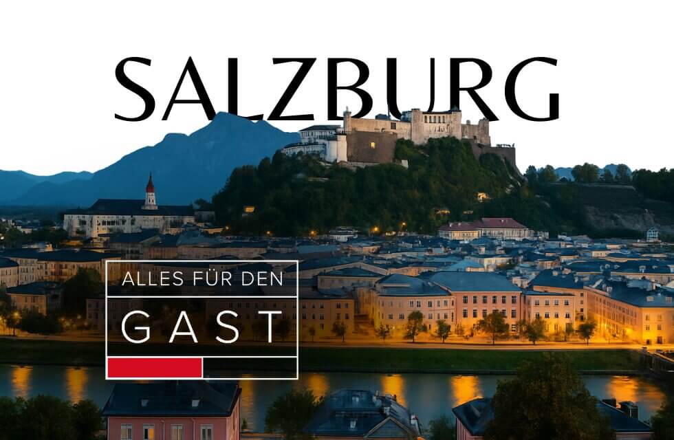 Salzburg skyline at dusk with fortress and river