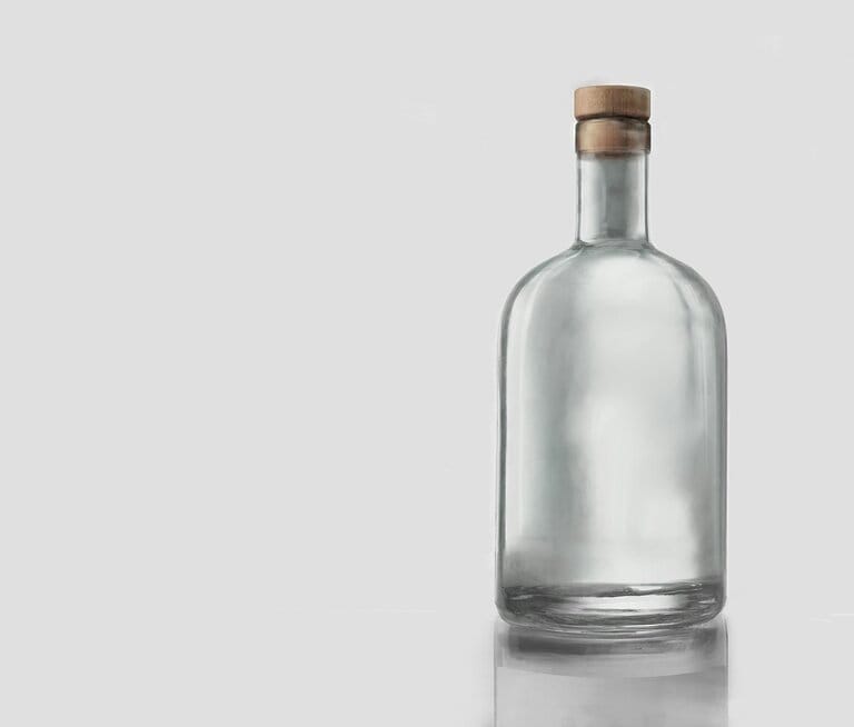 Clear glass bottle with cork stopper