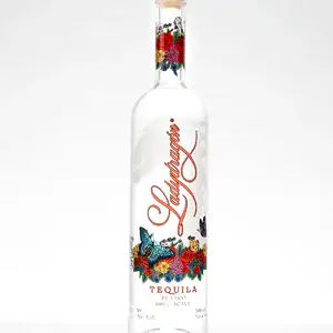 Ladydragon Tequila Blanco Flasche mit floralem Design.