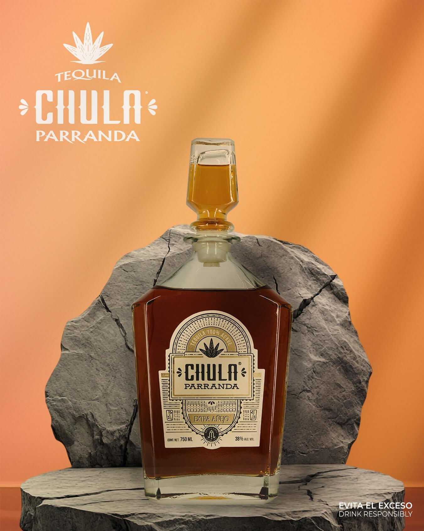Chula Parranda Extra Añejo tequila bottle on rock