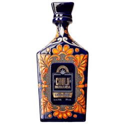 Ornate blue tequila bottle with orange floral design