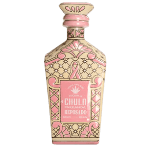 Decorative pink and cream tequila bottle