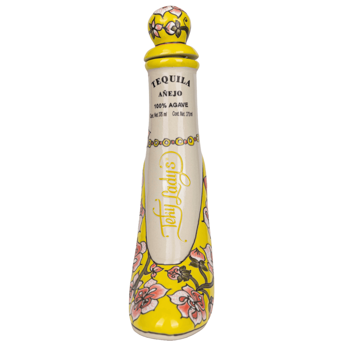 Decorative yellow tequila bottle with floral design