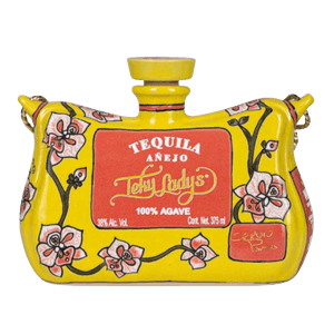 Yellow floral ceramic tequila bottle with red label